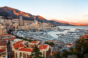 Monaco city and port at sunset.