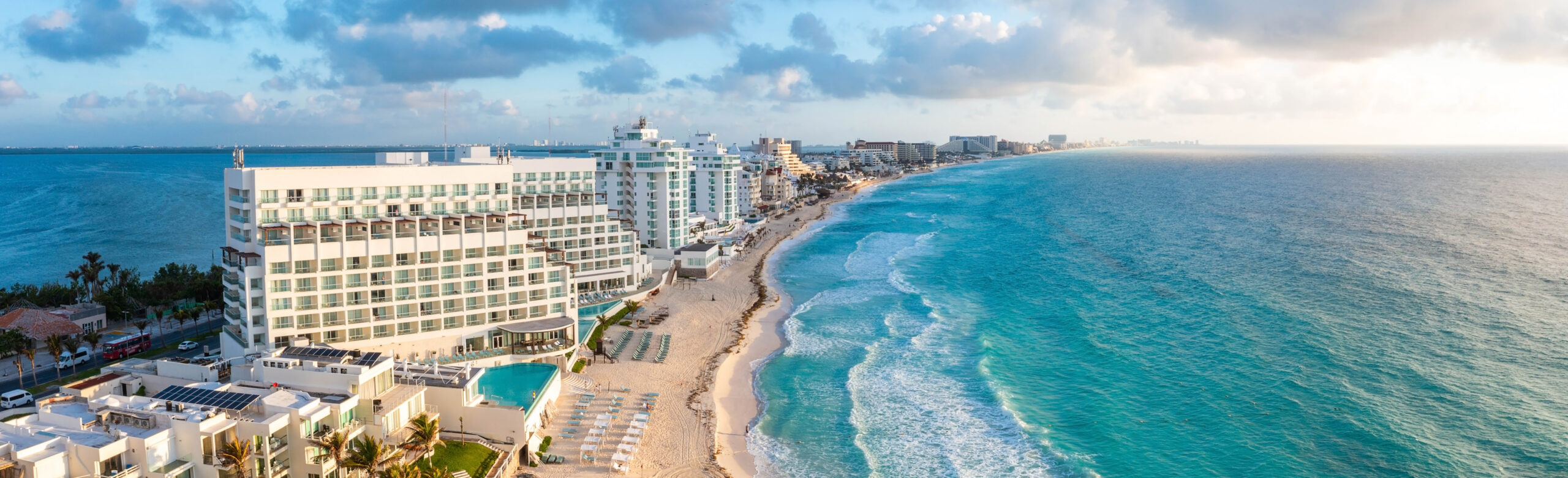 Empty Legs Private Jet - Beachfront Image with buildings and Hotels