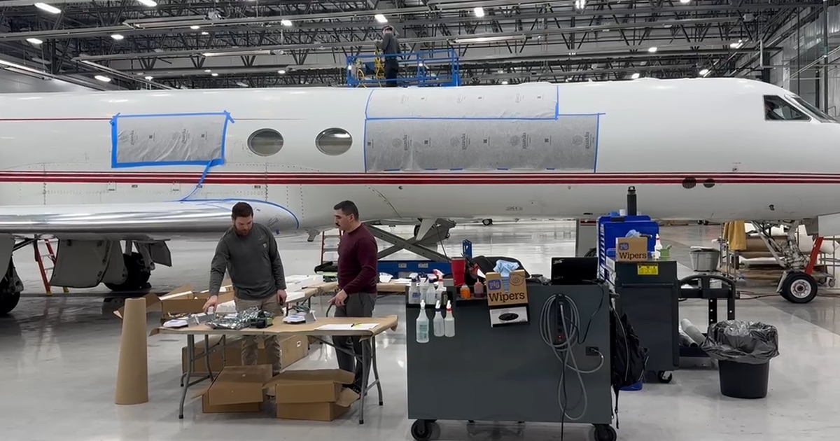 CEO reviewing status of starlink installation on airframe